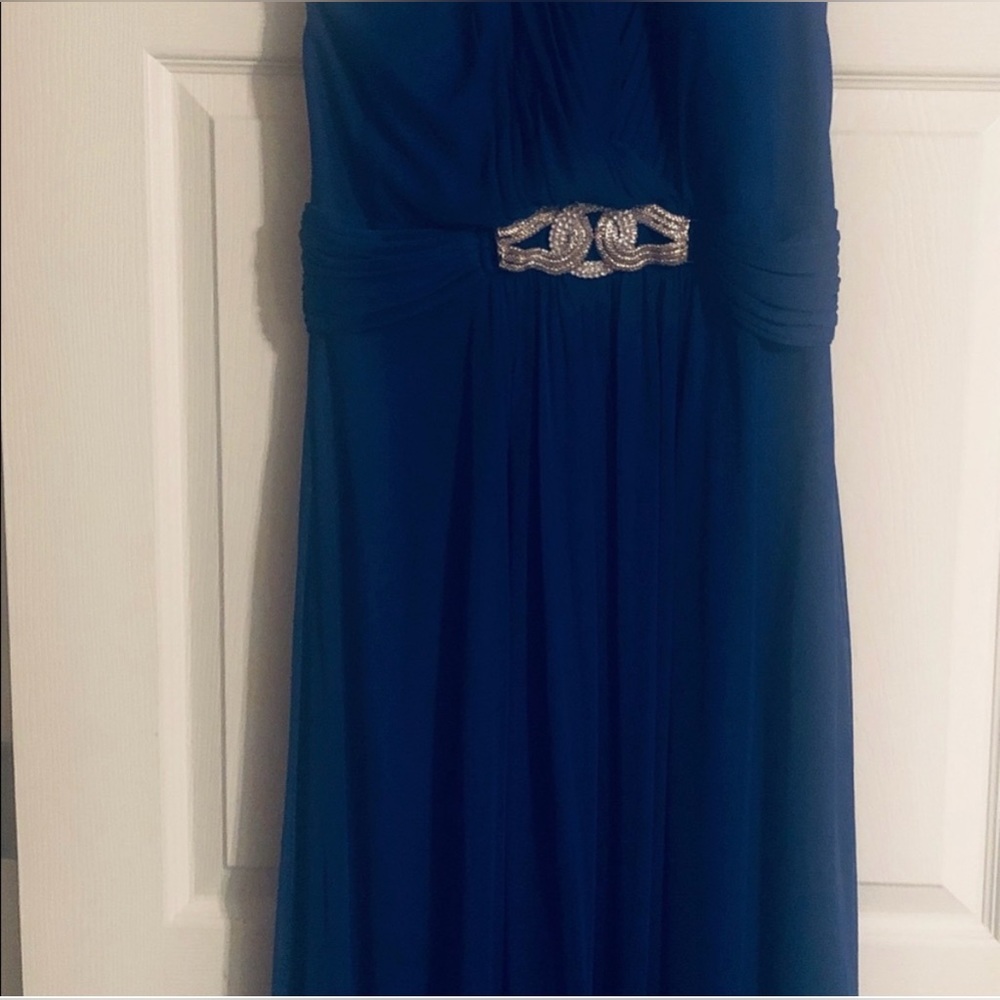 Beautiful new with tags. Vivid royal blue.